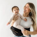 TUSHBABY Original Hip Seat Baby Carrier for Toddlers, Black & Gold